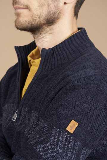 Jacquard and cable half zip collar